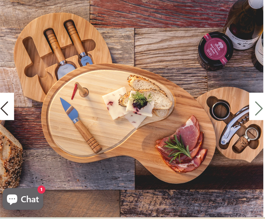 Aerial view of the Sand Trap Golf-Inspired Bamboo Cheese Board styled with charcuterie, cheese, and wine accessories