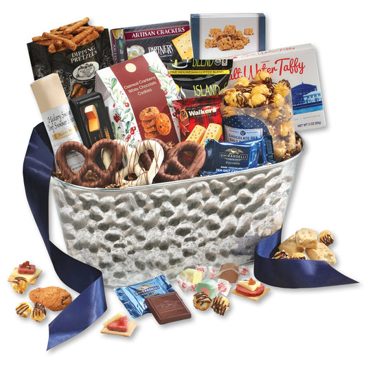 gourmet treats in a hammered metal gift basket