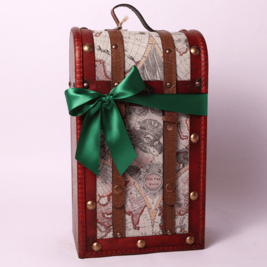 A beautifully curated retirement gift for women, featuring gourmet snacks in a stylish travel-themed chest. Ideal as a retirement gift for men or women who appreciate delicious treats.