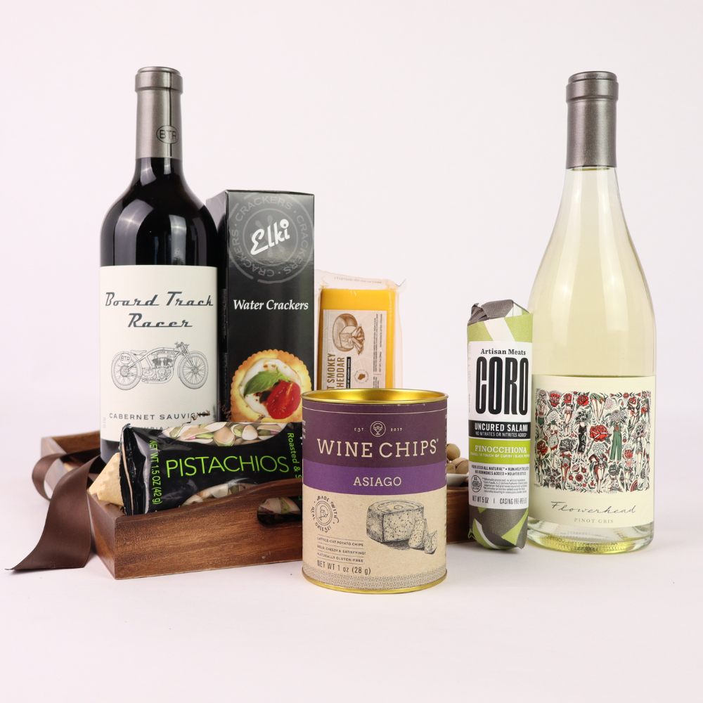 Wine bottles and snacks on a white background